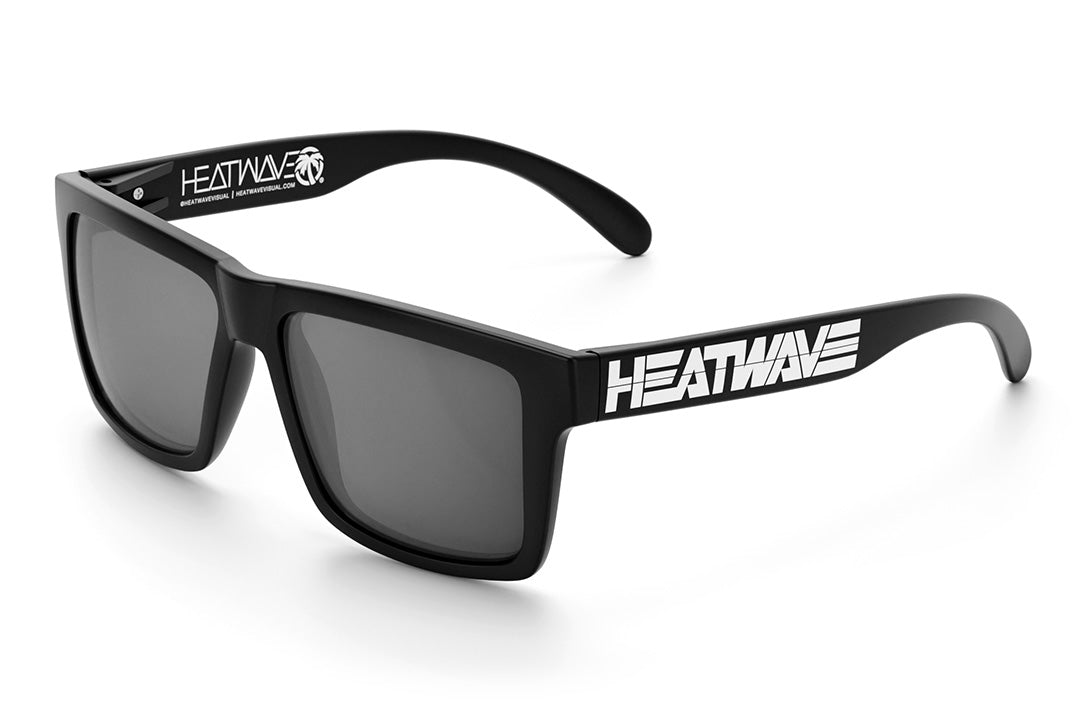 Heat Wave Visual Vise Sunglasses with black frame, Heatwave Billboard print arms and silver lenses.