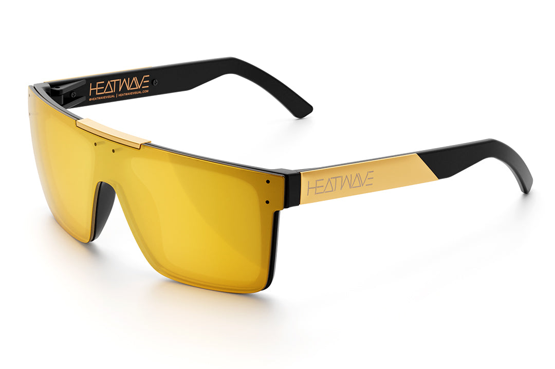 Heat Wave Visual Quatro Sunglasses with black frame, gold metal arms and gold lens.