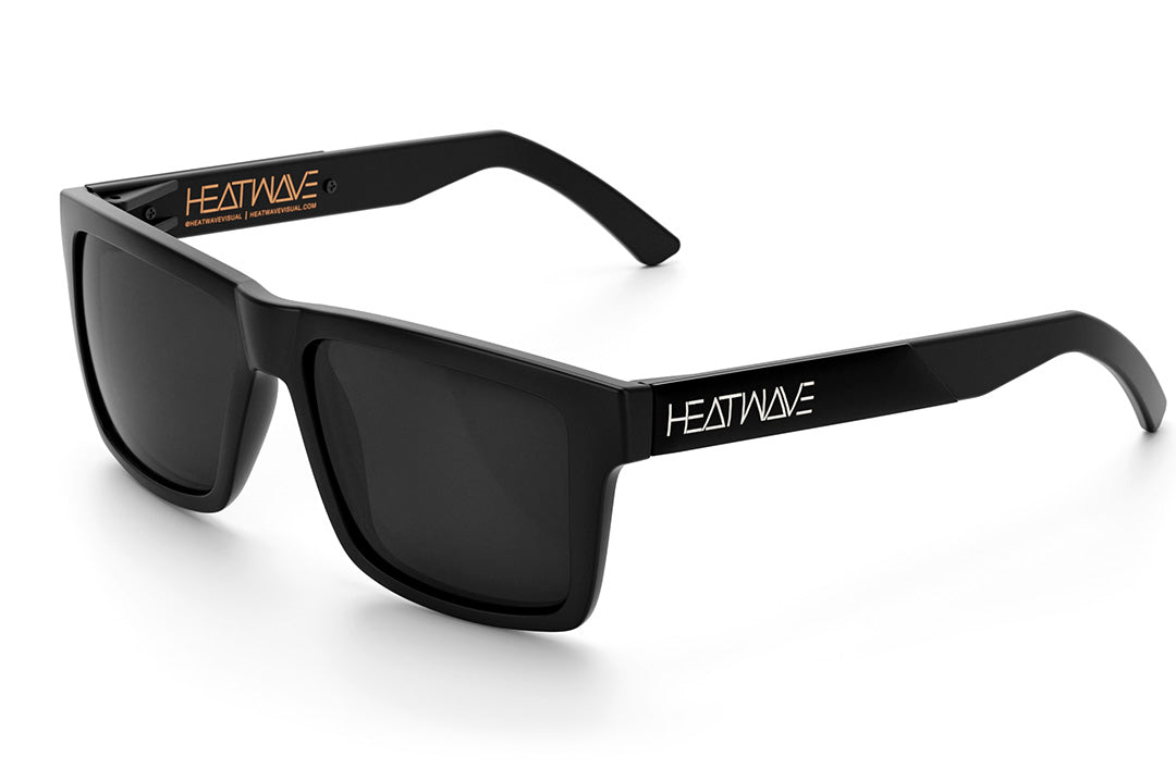 Heat Wave Visual Vise Sunglasses with black frame, black metal arms and black lenses. 