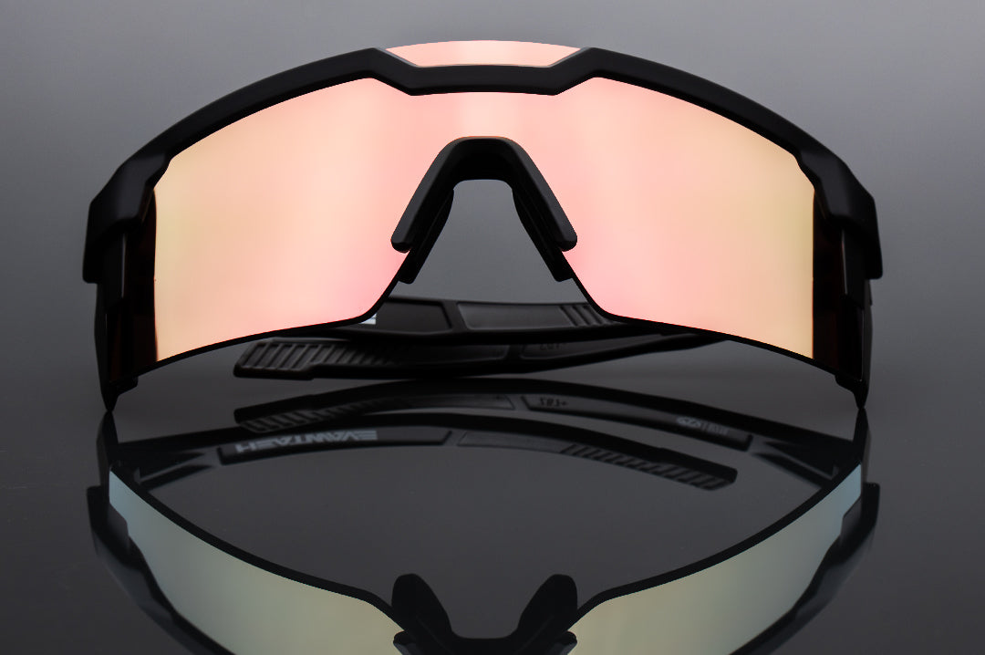 Front of Heat Wave Visual Future Tech Sunglasses with black frame and rose gold lens.