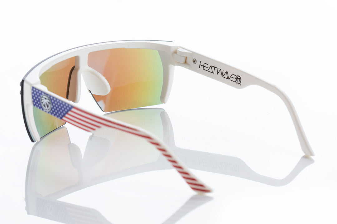 Back view of Heat Wave Visual Lazer Face kids sunglasses white frame, USA print arms and galaxy blue lens.