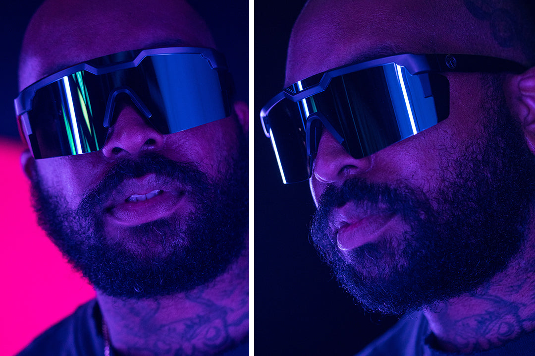 Bearded man in the club wearing Heat Wave Visual Future Tech Sunglasses with black frame and silver lens.