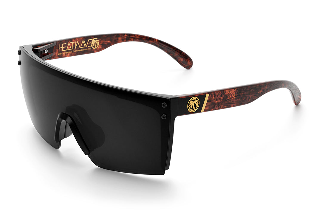 Heat Wave Visual Lazer Face Sunglasses with black frame, woodgrain print arms and black lens.