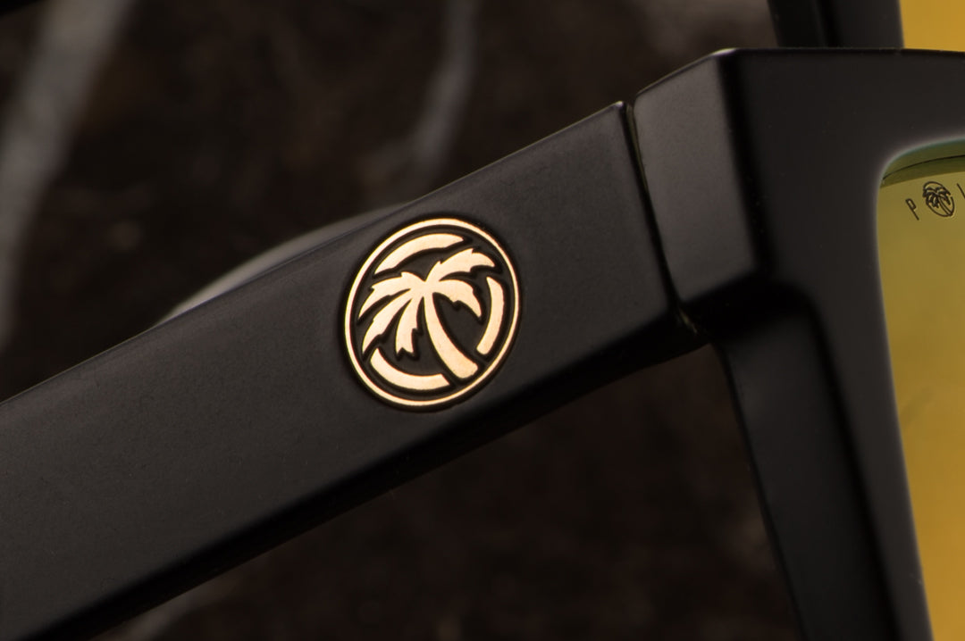 Heat Wave Visual black arms with gold emblem.