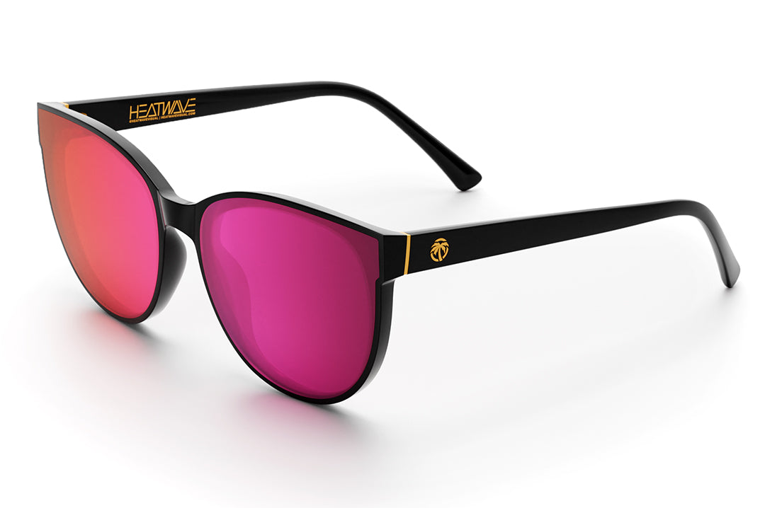 Heat Wave Visual Womens Carat Sunglasses with black frame and fuchsia lenses.