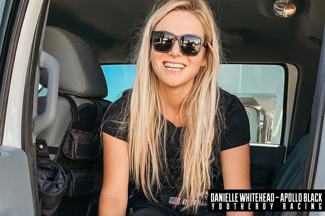 Danielle Whitehead rocking the Heat Wave Visual Apollo Sunglasses with black frame and black lenses.