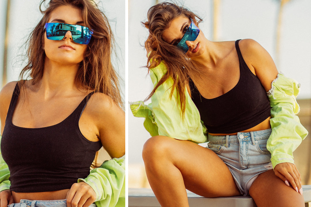 Female model wearing Heat Wave Visual Quatro Sunglasses with black frame and galaxy blue lens.