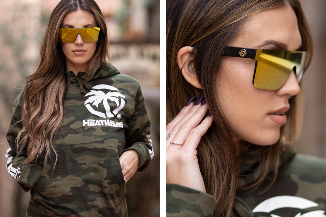 Close up of women wearing Heat Wave Visual Quatro black frame and gold lens.