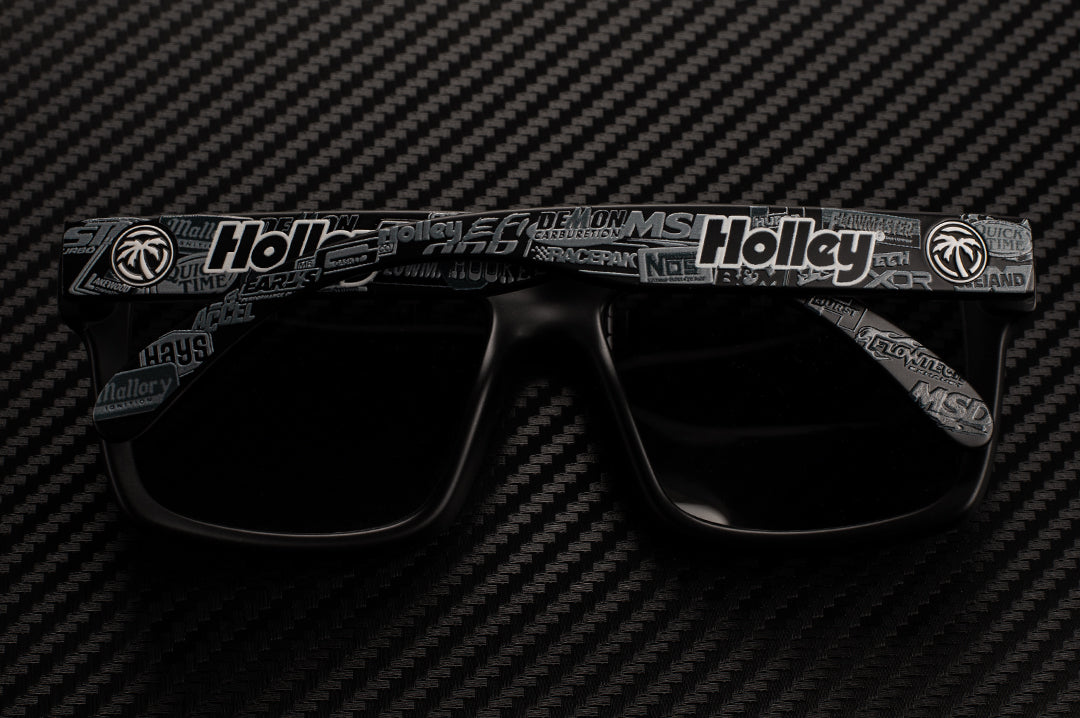 Back of the Heat Wave Visual Vise Sunglasses with black frame, holley print arms and black lens.