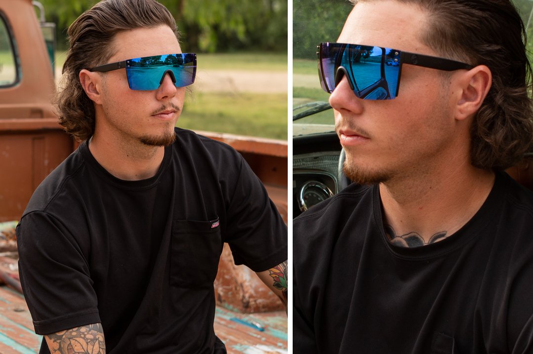 Man sitting on truck bed wearing Heat Wave Visual Lazer Face Z87 Sunglasses with black frame and galaxy blue lens.
