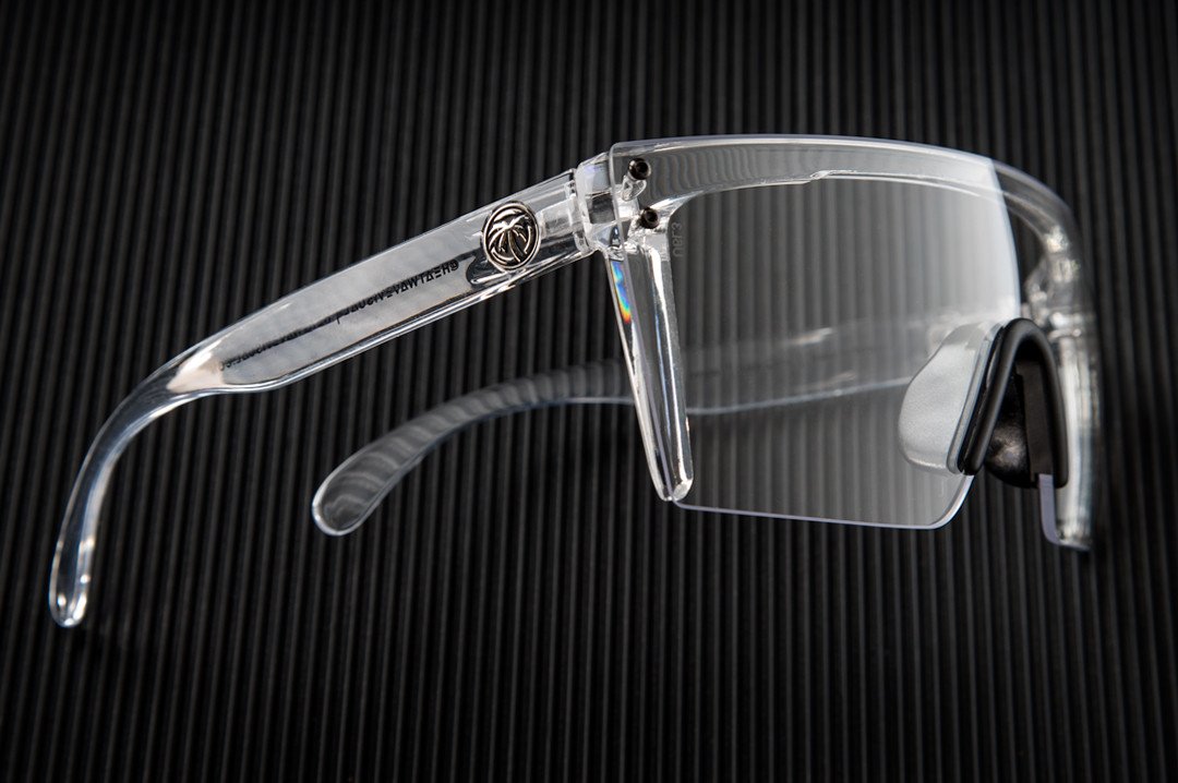 Side view of Heat Wave Visual Lazer Face Z87 Sunglasses with clear frame, Black nose piece and clear lens.