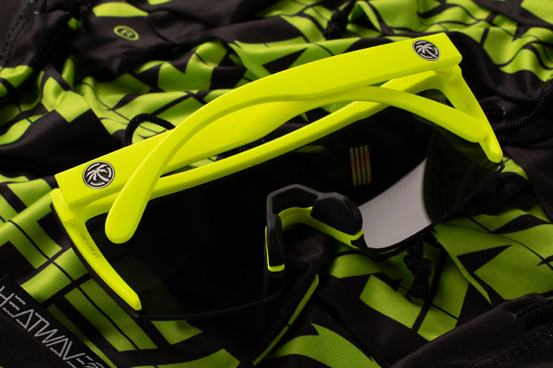 Back view of Heat Wave Visual Lazer Face Z87 Sunglasses with neon yellow frame and black lens.
