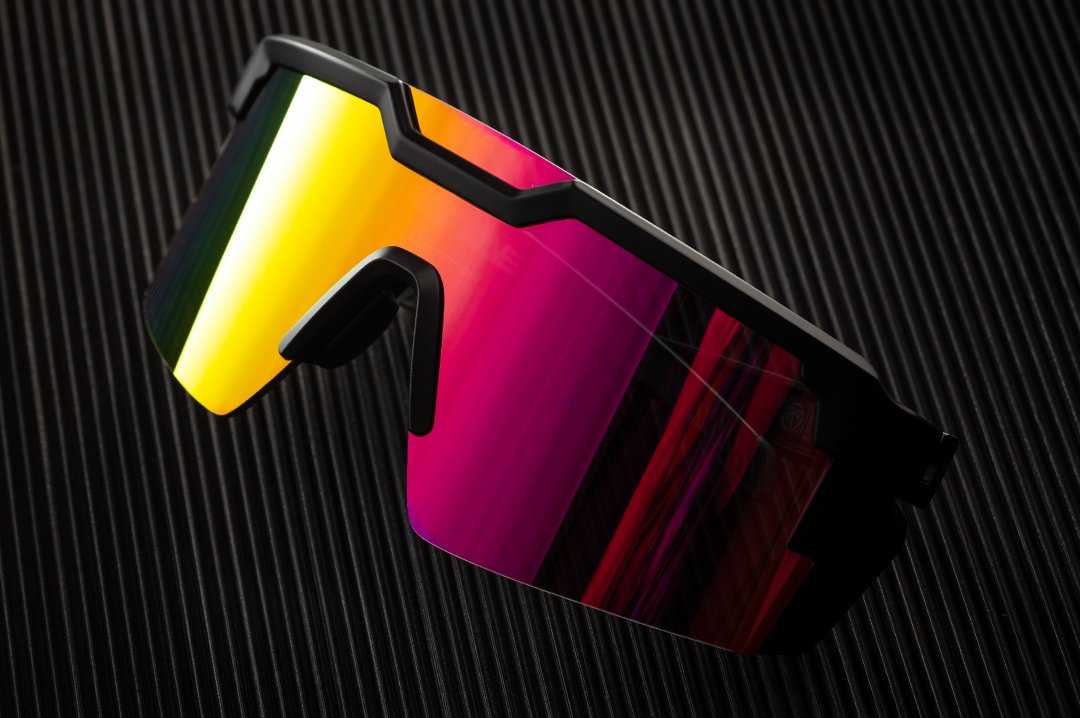 Heat Wave Visual Future Tech Sunglasses with black frame and spectrum pink lens.