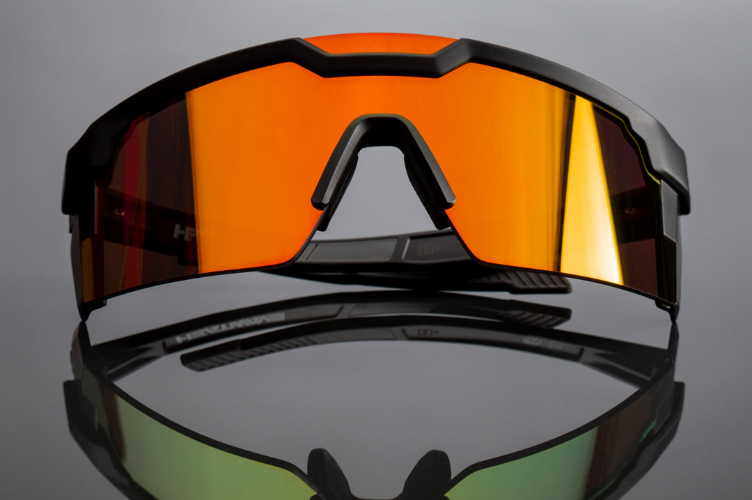 Front of Heat Wave Visual Future Tech Sunglasses with black frame and sunblast orange yellow lens.