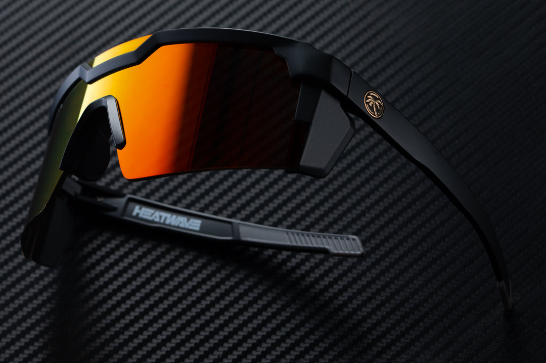 Heat Wave Visual Future Tech Sunglasses with black frame and sunblast orange yellow lens.