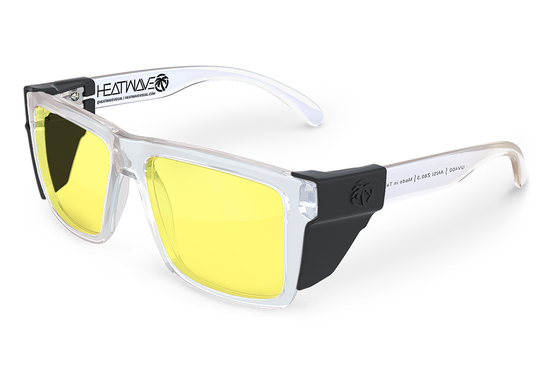 Heat Wave Visual Vise Z87 Sunglasses with clear frame, hi-vis yellow lenses and black side shields. 